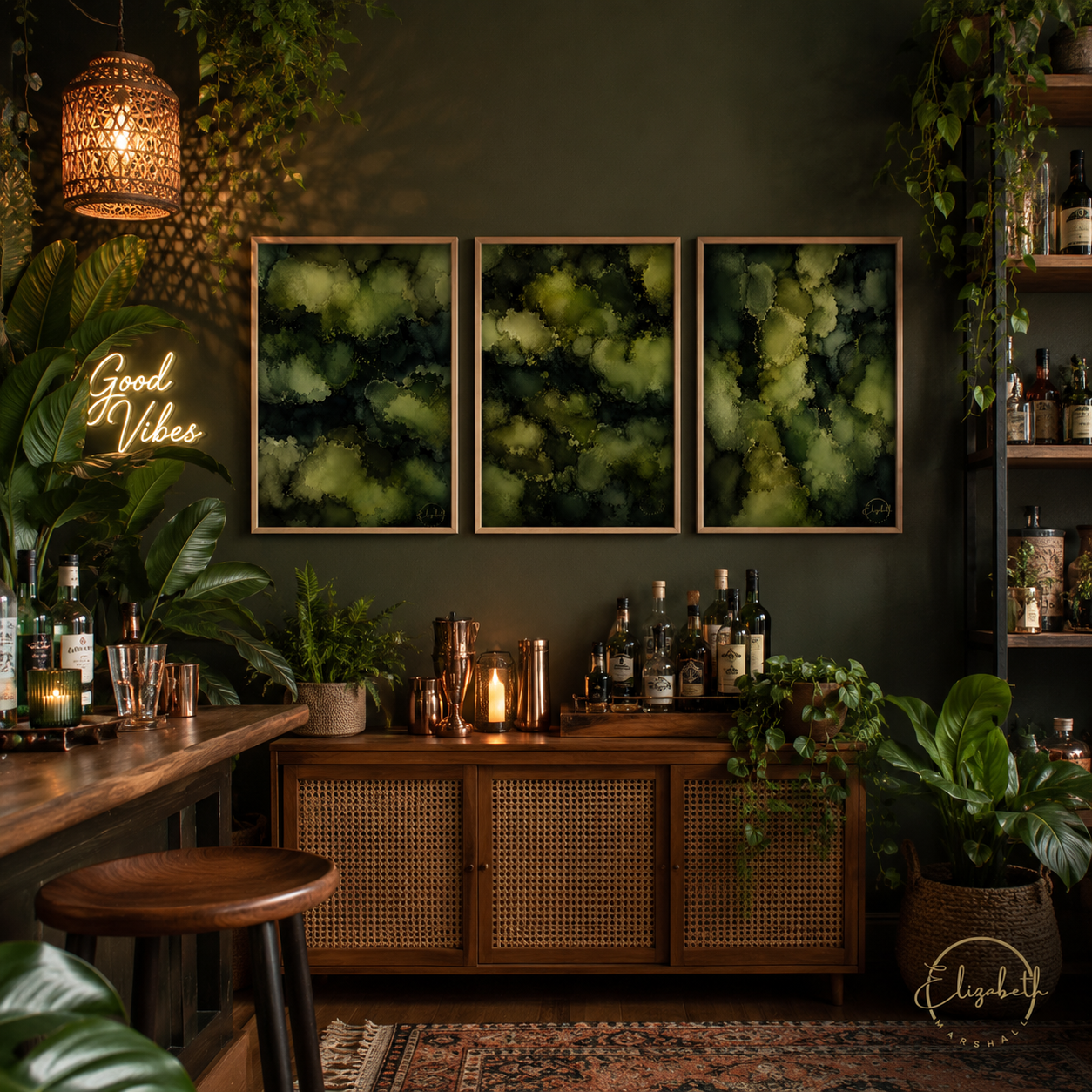 Neon sign 'Good Vibes' in a bar setting with green wall art and wooden furniture.