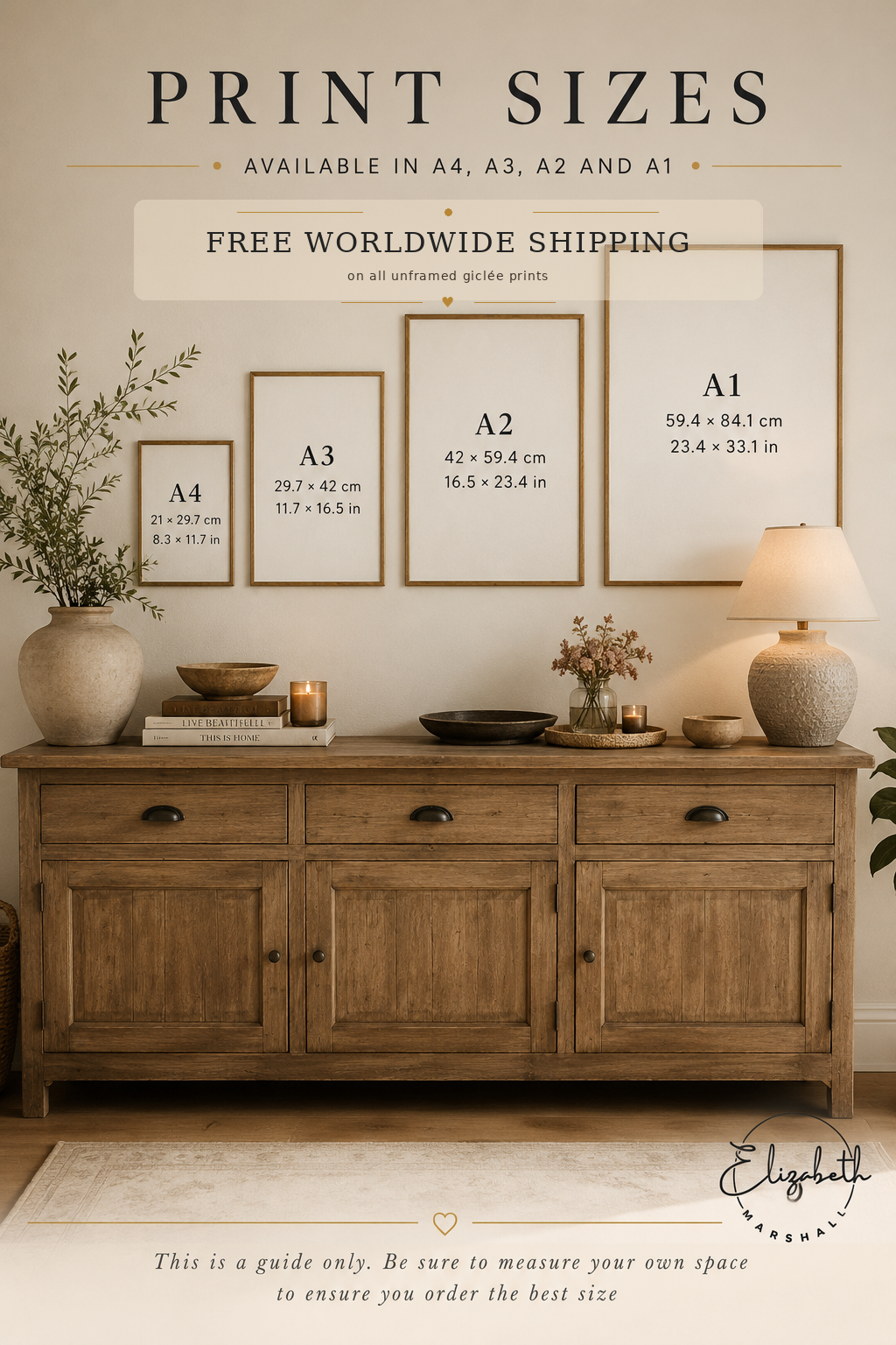 A styled interior scene showing four framed print sizes labeled A4, A3, A2, and A1 with dimensions printed on the frames. The frames hang above a wooden sideboard with a lamp, books, bowls, and decorative plants.