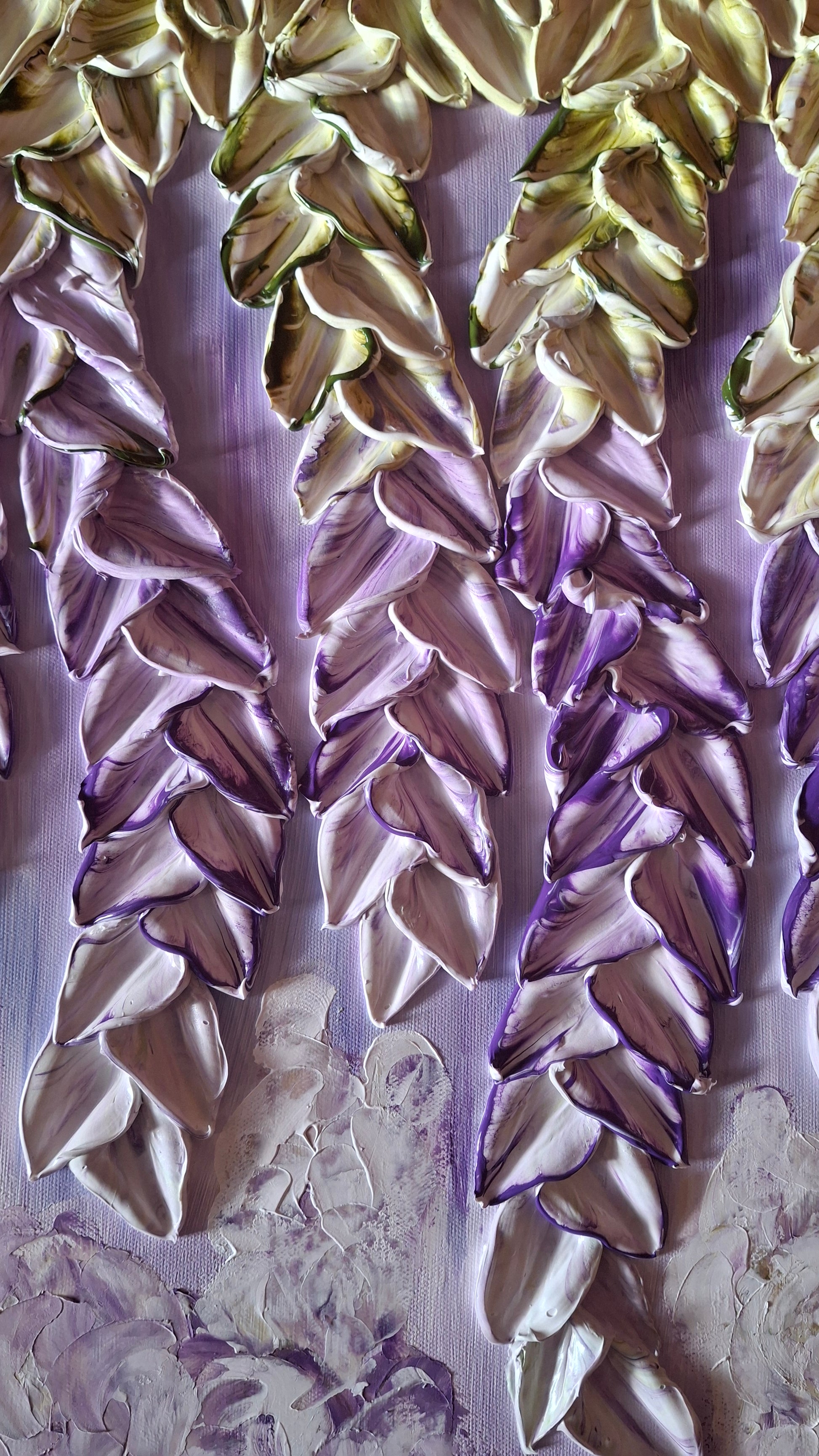 An abstract textured painting featuring metallic gold, silver, and purple leaf-like or feather-like shapes arranged diagonally on a mottled lavender and gray background.