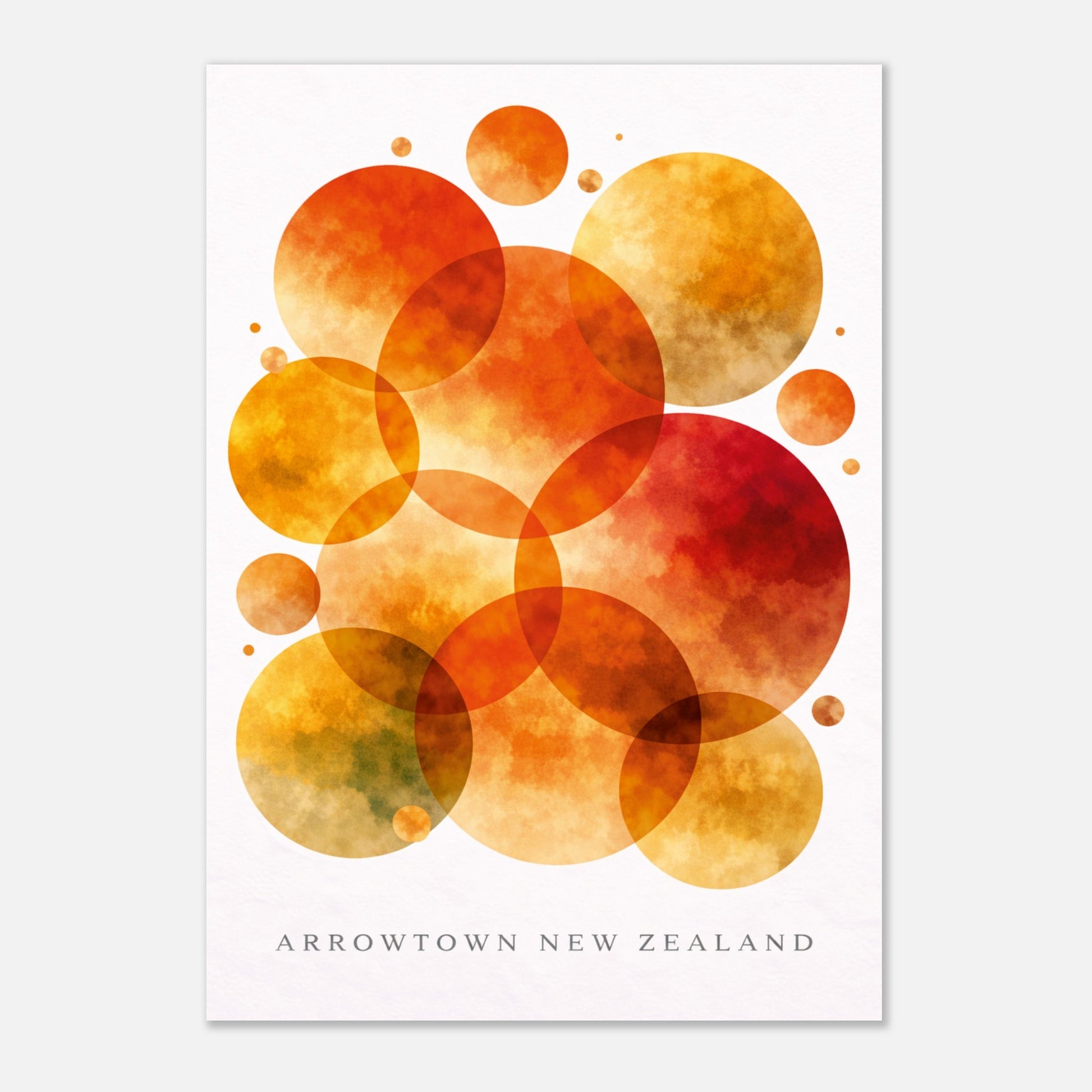 A vertical art print featuring overlapping translucent watercolor circles in orange, yellow, and red tones on a white background, with the text 'ARROWTOWN NEW ZEALAND' printed at the bottom.