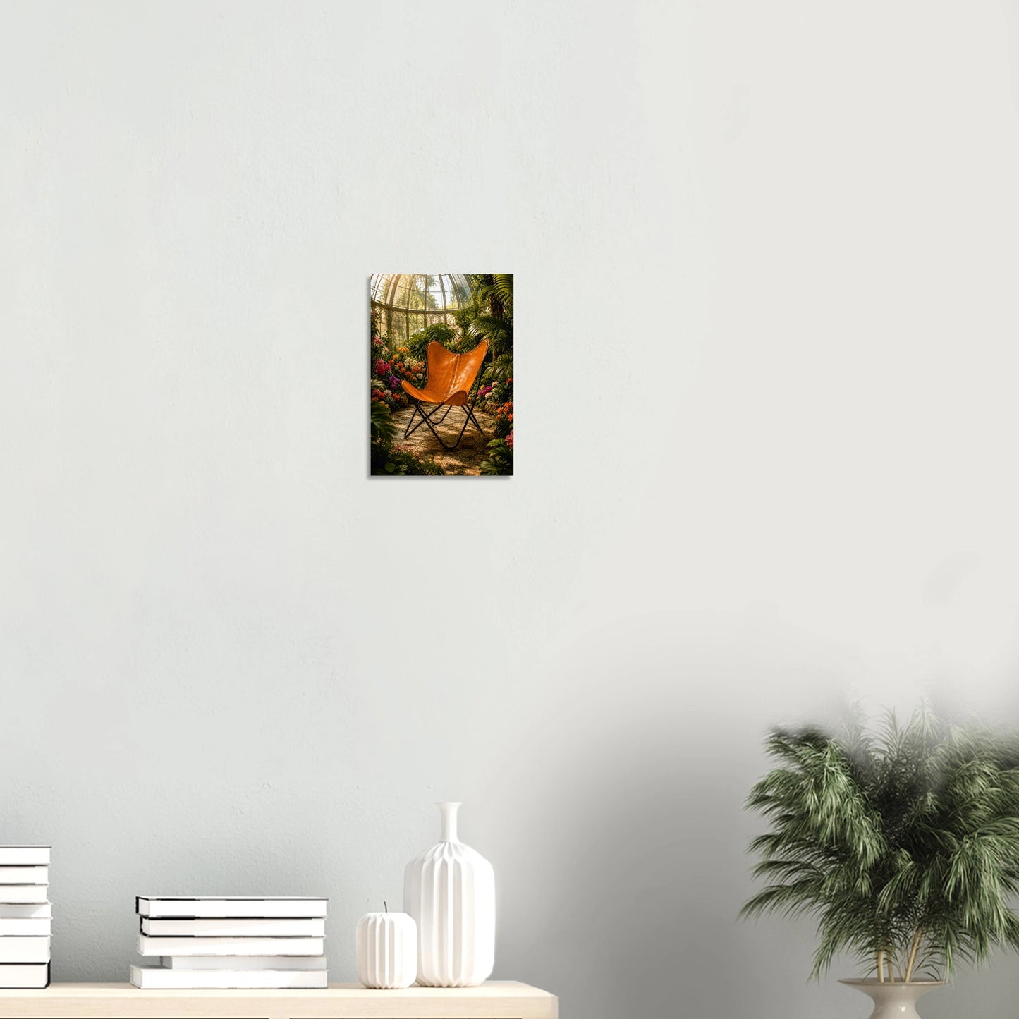 Iconic BKF butterfly chair in a sun-drenched glasshouse. Warm botanical giclee print inspired by original designs. 200gsm FSC paper. Ships worldwide.