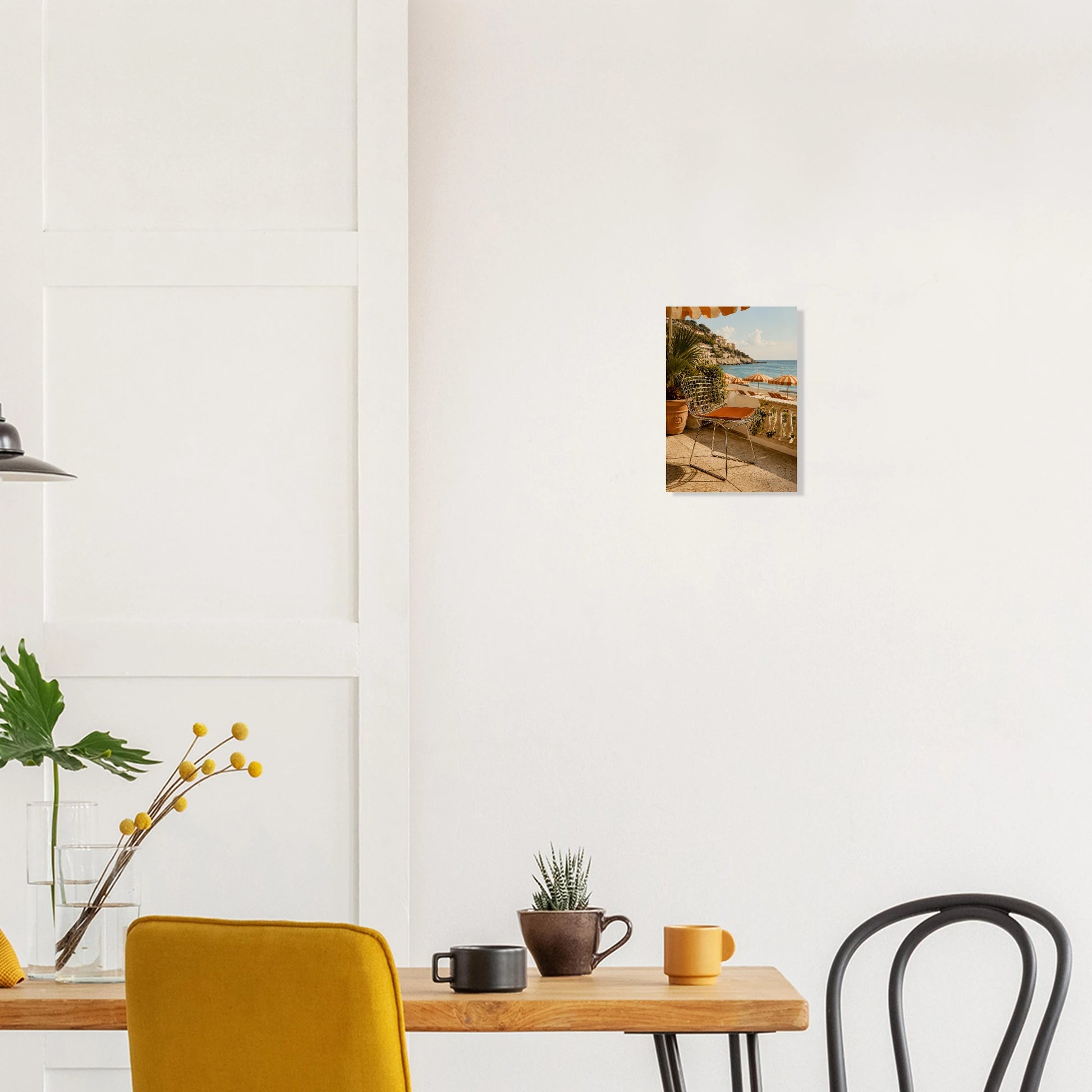 Bertoia-inspired wire chair on a sun-drenched Amalfi Coast terrace. Warm coastal giclee print inspired by original designs. 200gsm FSC paper. Ships worldwide.