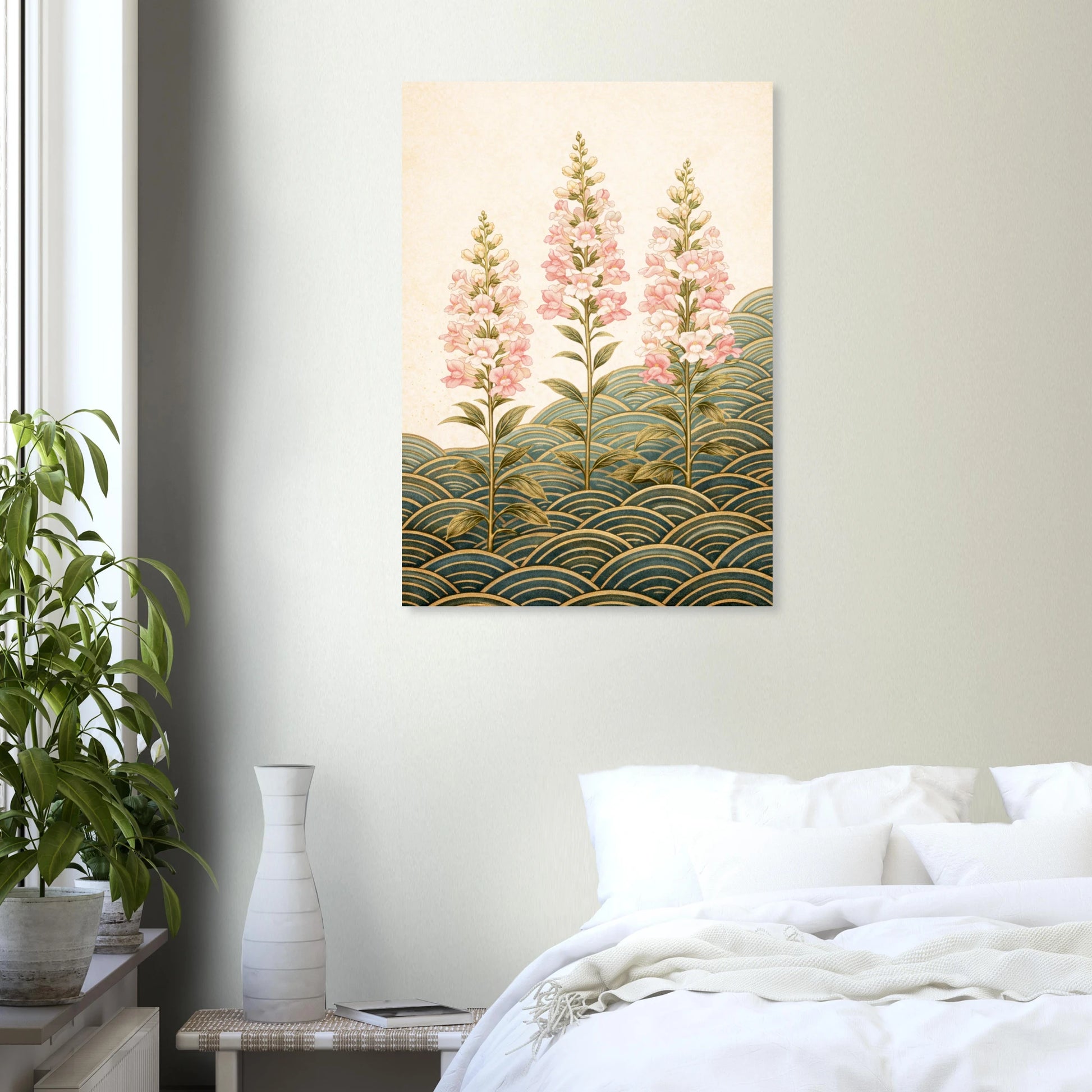 A vertical wall art print featuring three pink flower spikes rising above layered green and gold wave-like patterns, displayed above a bed in a softly lit bedroom with a plant and vase nearby.
