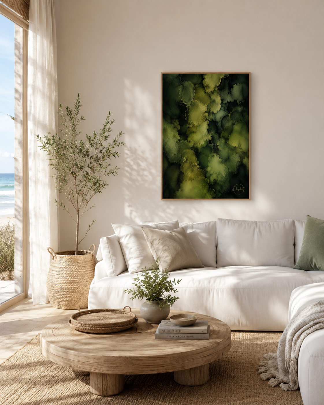 A framed abstract canvas print featuring textured green and yellow-green brushstrokes, hanging on a warm beige wall above a white sofa in a bright, modern living room.