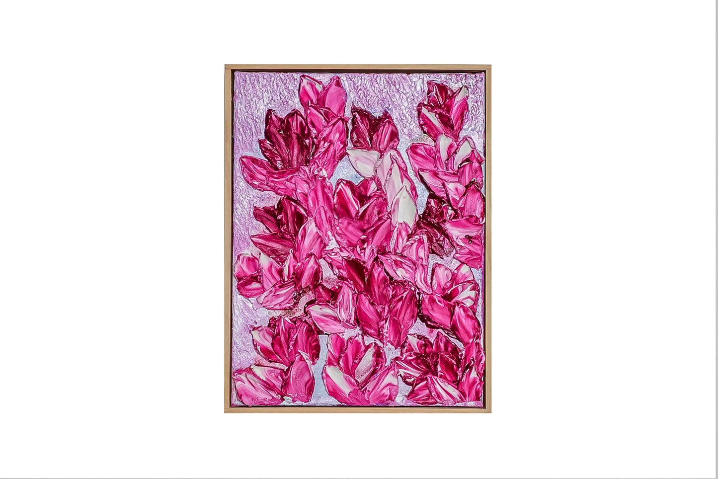 Magnolia Joy is an original acrylic painting that stops you in your tracks. Deep magenta and hot pink magnolia blooms cascade across a soft lavender-blush background, each petal built up in thick, sculptural layers of paint that catch the light and demand to be touched. It is bold, joyful and completely alive.