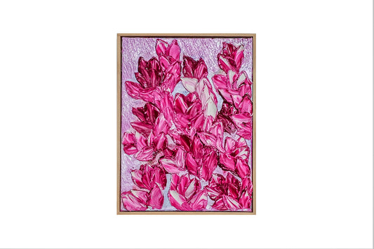 Magnolia Joy is an original acrylic painting that stops you in your tracks. Deep magenta and hot pink magnolia blooms cascade across a soft lavender-blush background, each petal built up in thick, sculptural layers of paint that catch the light and demand to be touched. It is bold, joyful and completely alive.