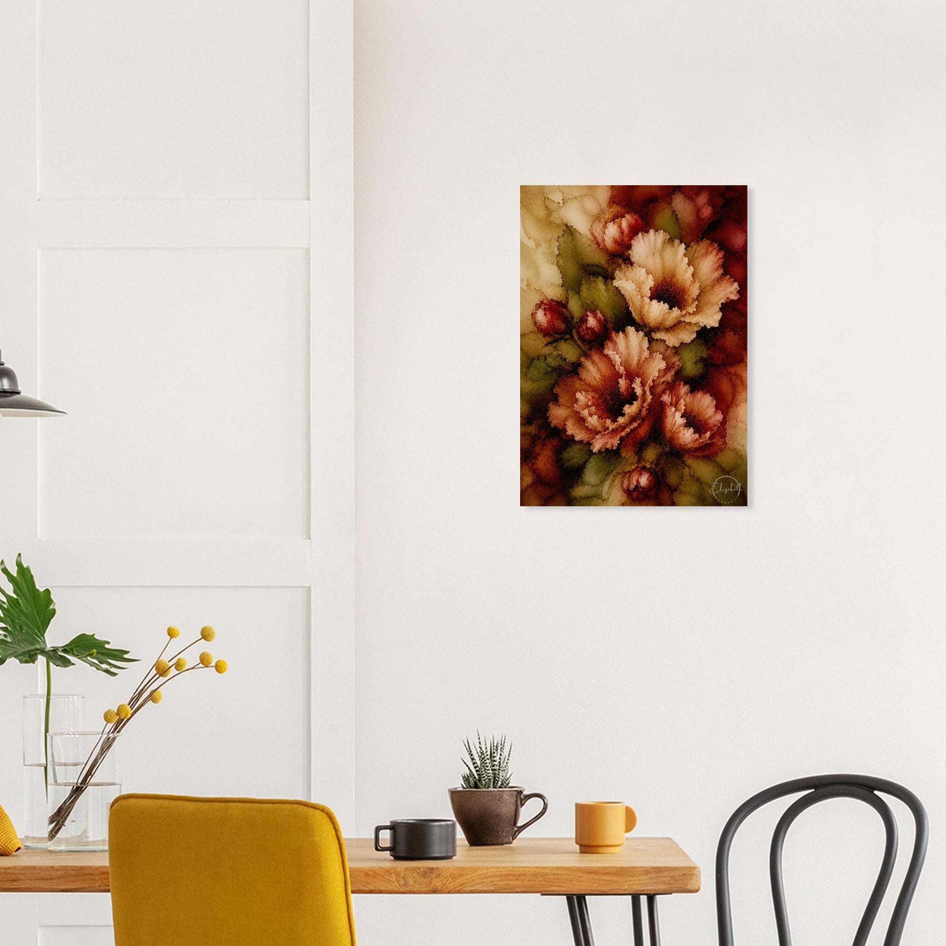 A vertical canvas wall art print featuring a vintage-style floral painting in warm earthy tones, hanging on a white wall above a wooden dining table with chairs and mugs.