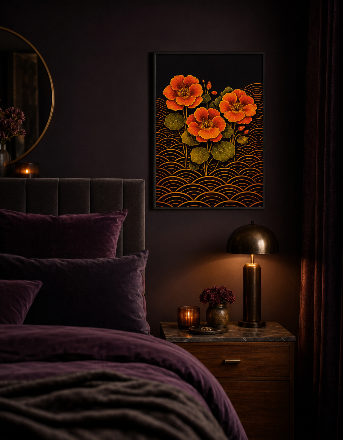 A framed wall art print featuring three bright orange flowers with green leaves above a black and gold wave pattern, displayed in a dark, moody bedroom above a wooden nightstand with a lit lamp.