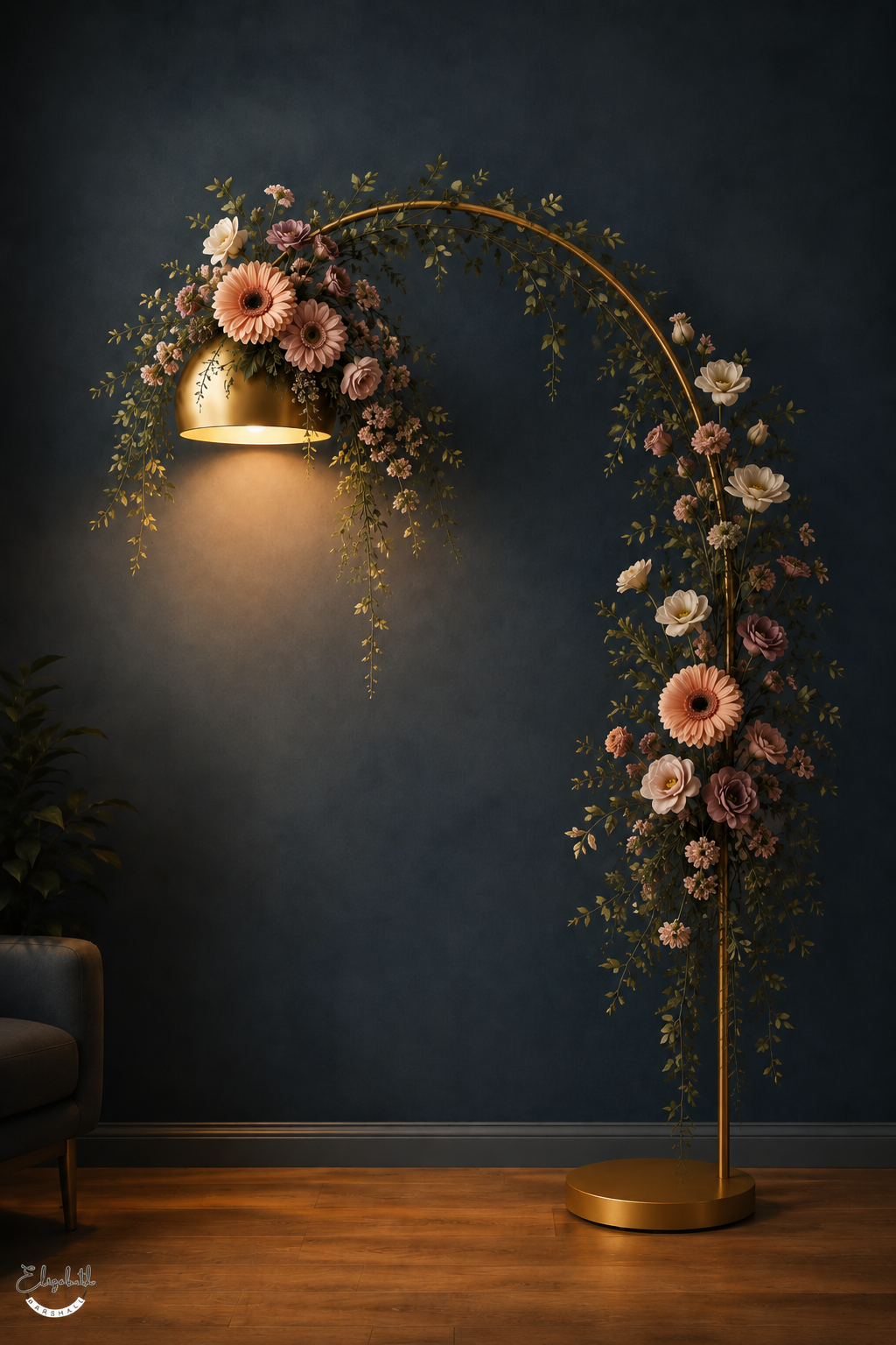 A gold arched floor lamp decorated with pink, peach, and white flowers and green foliage, set against a dark blue wall in a styled interior scene.
