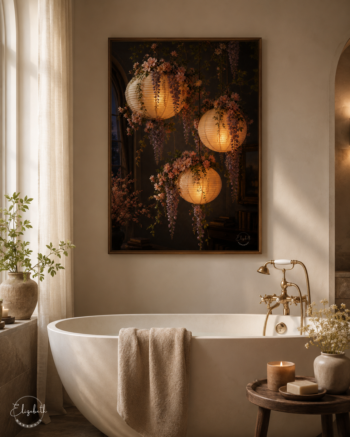A framed wall art print depicting three glowing paper lanterns and wisteria flowers, hung above a white freestanding bathtub in a softly lit bathroom setting.