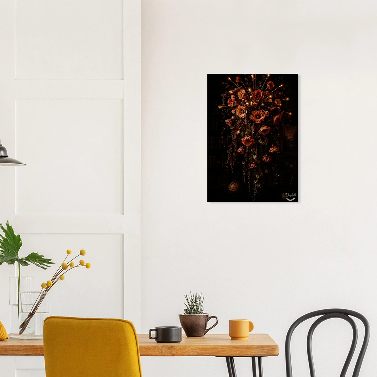 A dark, moody floral arrangement featuring large poppy-like flowers in muted red, pink, and orange tones with warm glowing lights along the stems, set against a very dark background. The artwork is presented as a vertical print with a white border and a small signature in the lower right corner.