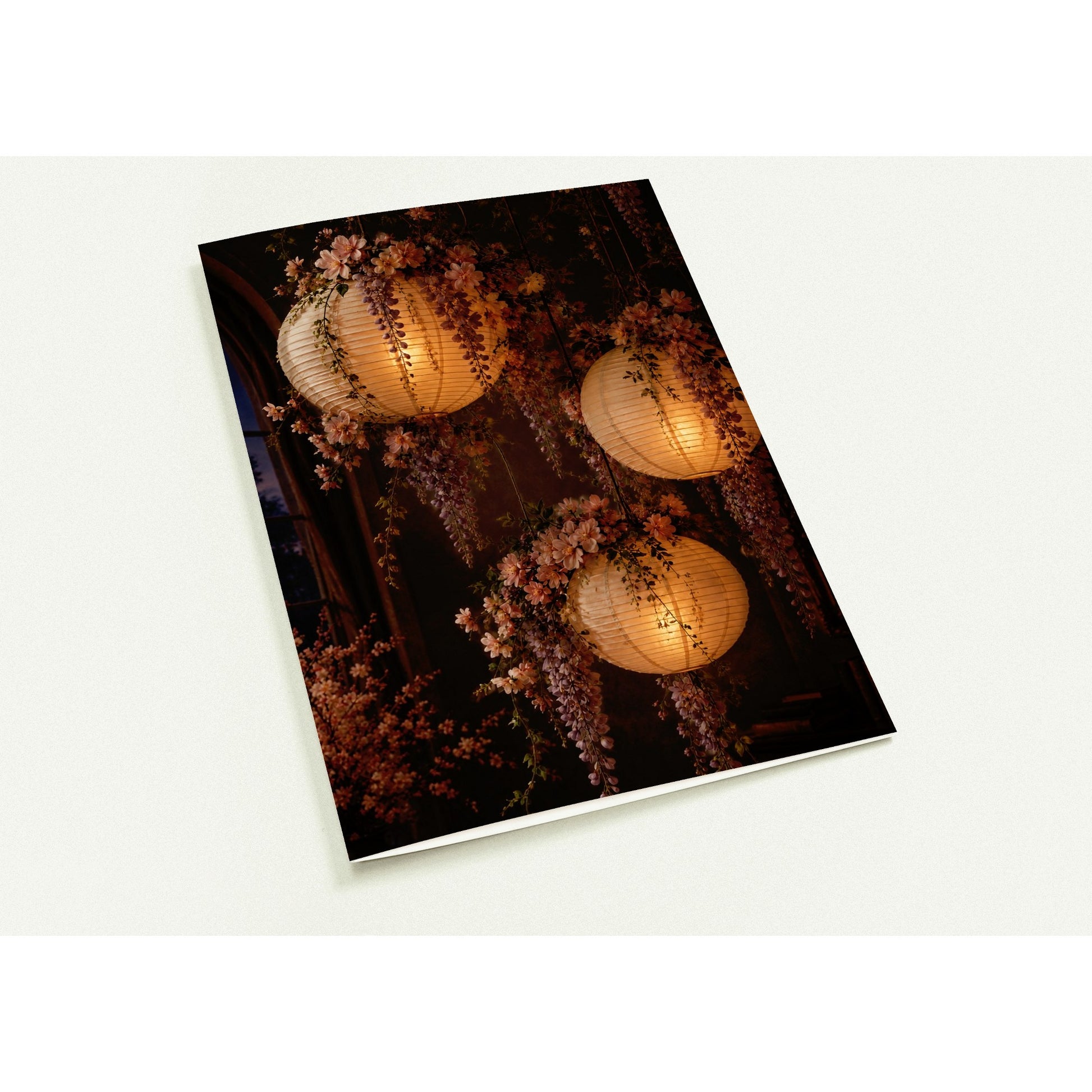 Decorative card with paper lanterns and floral elements on a white background