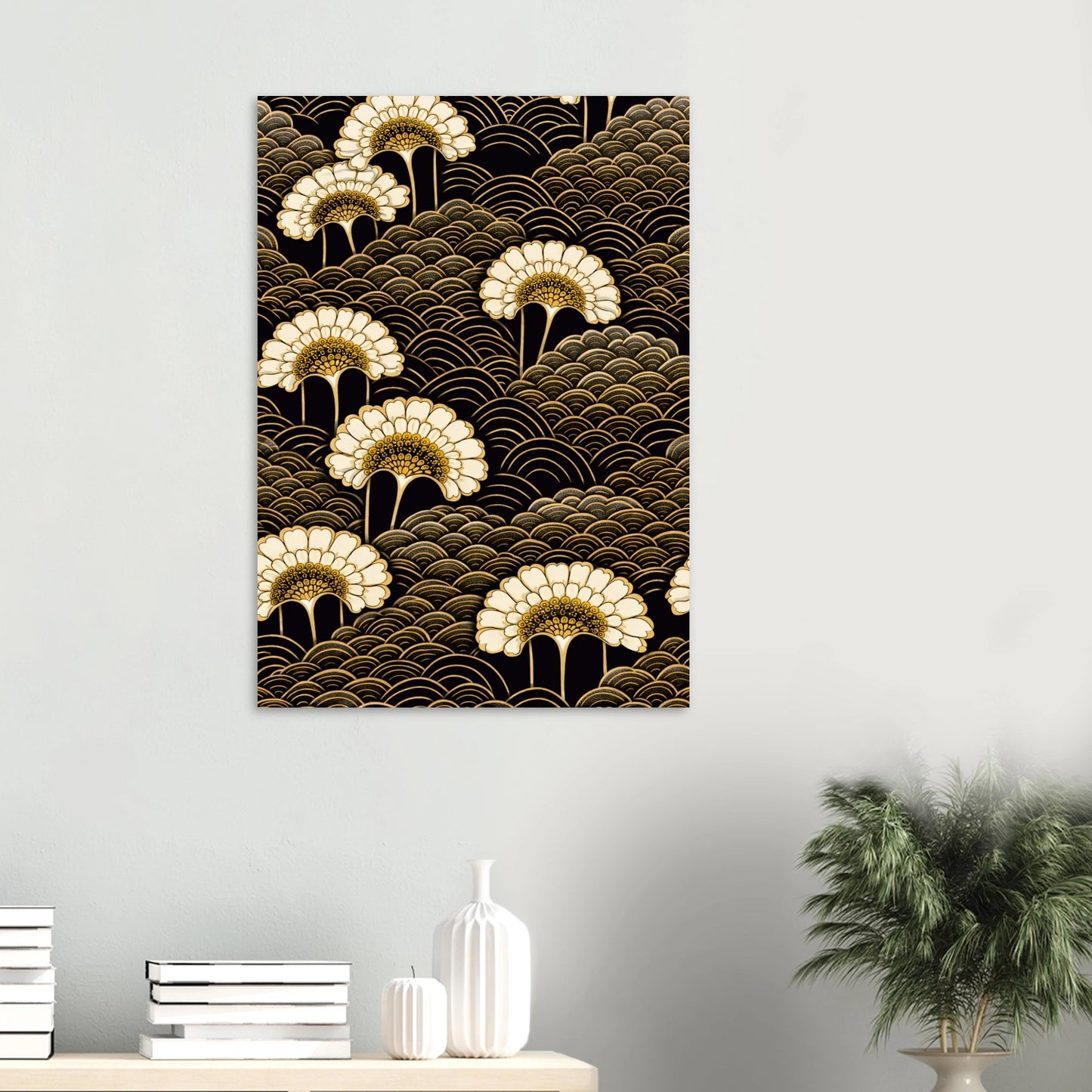 A vertical wall art print featuring a black and gold wave pattern with cream-colored fllower motifs, displayed on a light gray wall above a console table with books and a plant.
