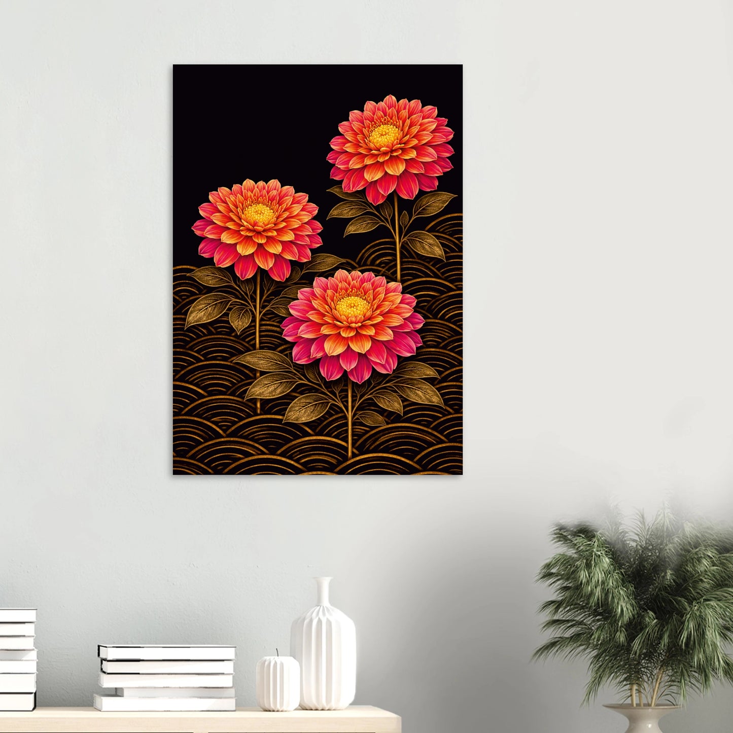 A vertical wall art print featuring three stylized pink and orange flowers with gold wave patterns on a black background, displayed on a light gray wall above a console table with books and a plant.