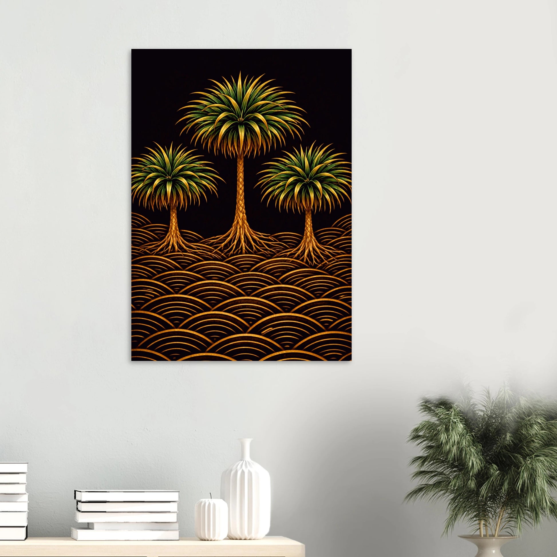 A vertical canvas wall art print featuring three stylized palm trees and golden wave-like lines on a black background, displayed on a light gray wall above a shelf with books, white vases, and a potted plant.