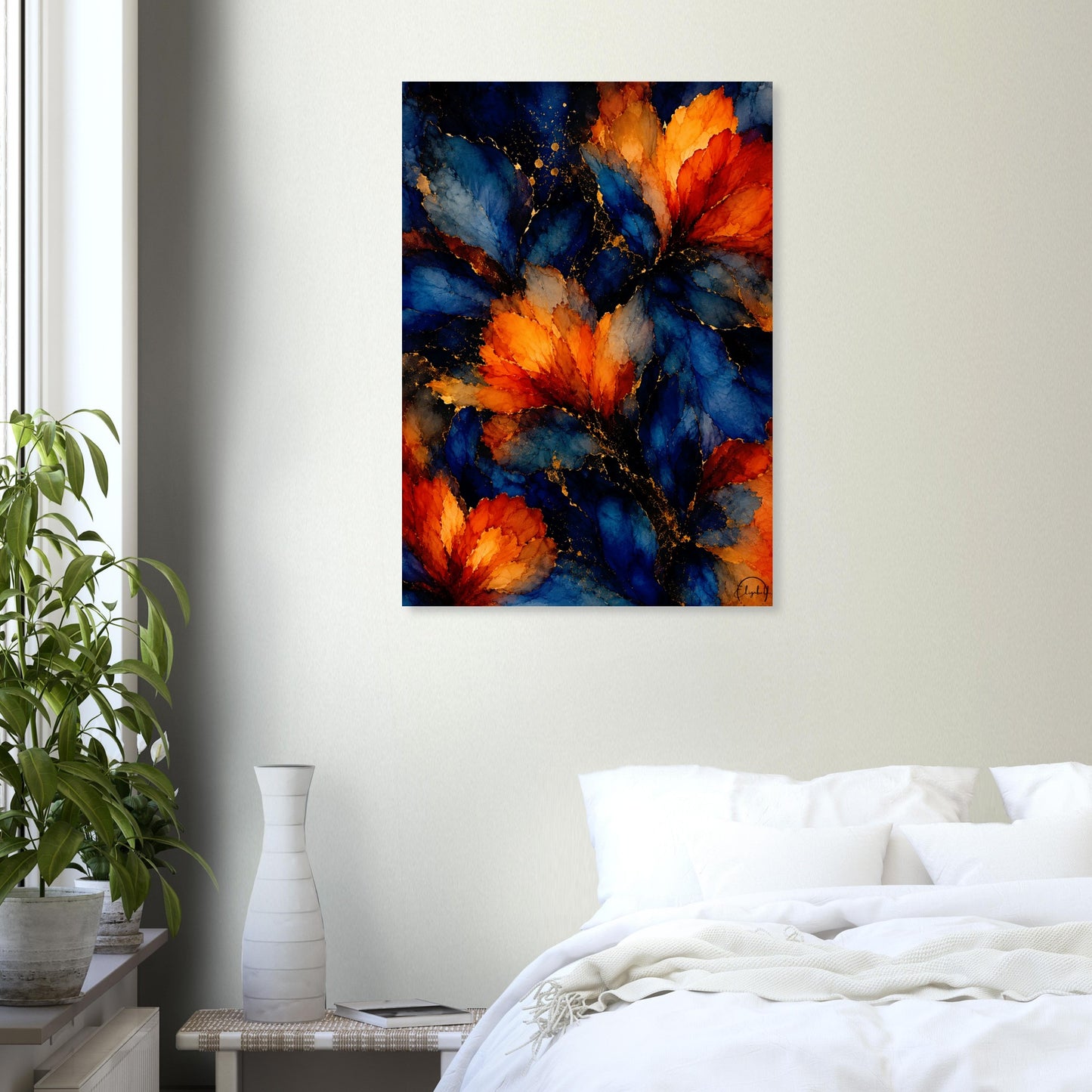 An abstract wall art print featuring vibrant orange and blue floral-like shapes with gold speckles, displayed on a light beige wall above a bed in a modern bedroom setting.