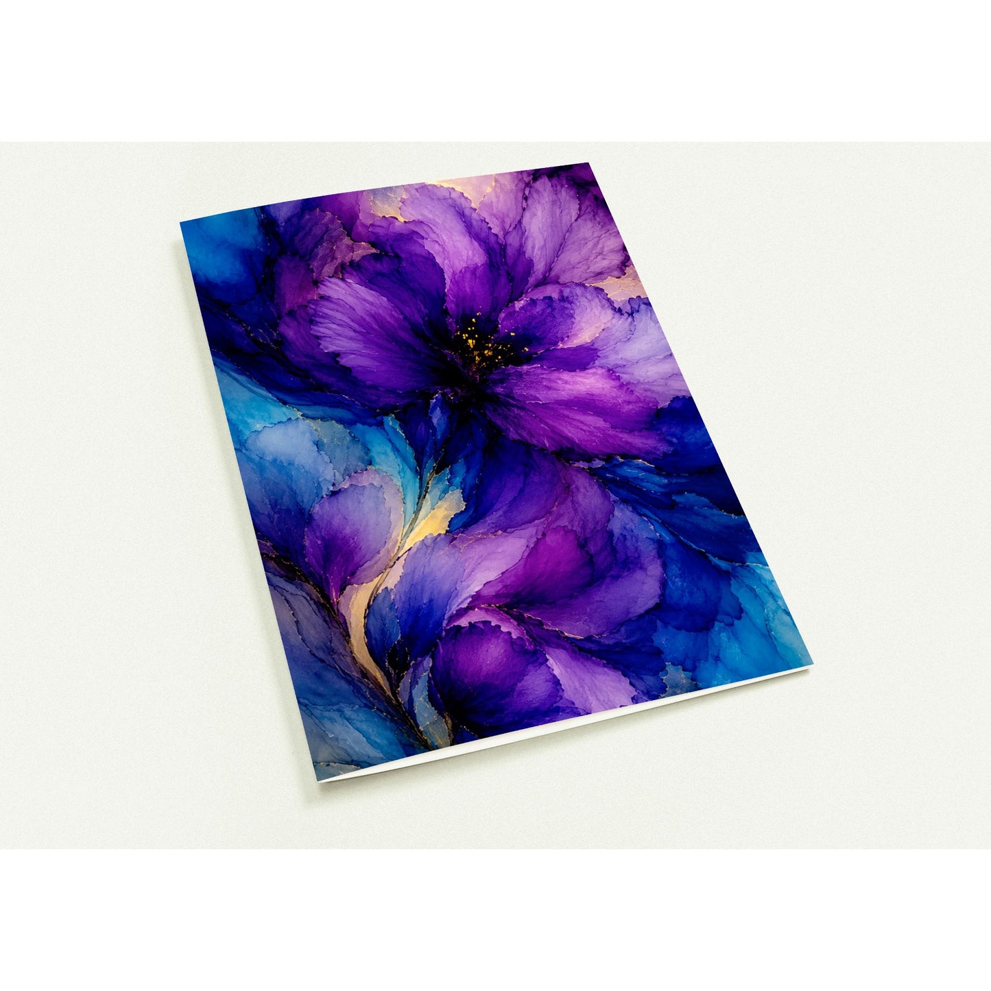 A rectangular art card featuring an abstract watercolor-style floral design in purple, blue, and black, photographed at an angle on a light neutral background.

Ten note cards that feel like a tiny gallery in an envelope. Rich, moody florals, deep jewel tones, and the kind of lush, layered colour that makes a handwritten note feel like a gift before it's even opened. These are the cards for people who believe that stationery should be as beautiful as the words inside.