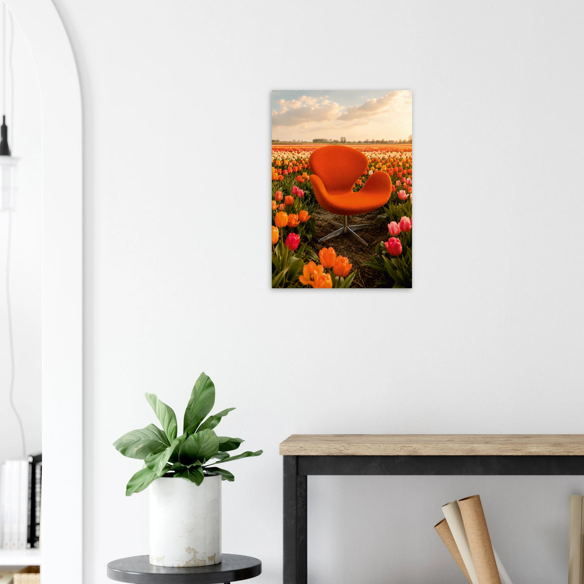 Tip Toe Through the Tulips skipped the tip-toeing entirely and went straight to sitting down in the middle of it all. A Swan Chair-inspired piece in vivid orange sits squarely in a vast Dutch tulip field, orange and hot pink blooms stretching to the horizon in every direction, the warm golden sky doing its best impression of a painting. The chair fits in perfectly. It was always going to.