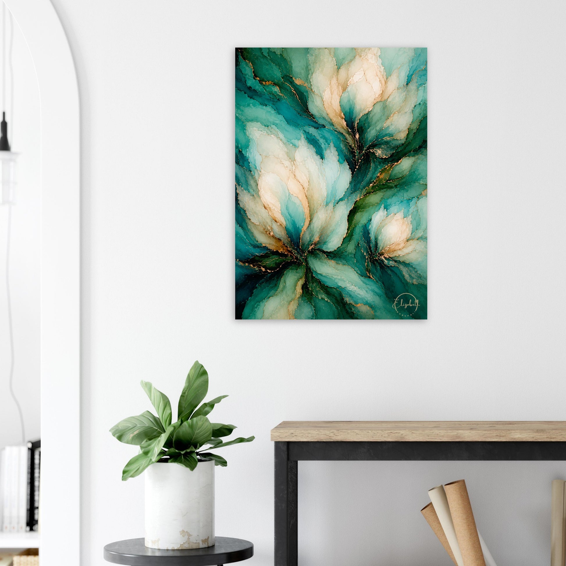 A vertical abstract floral wall art print with teal, aqua, cream, and gold marbling, displayed on a white wall above a console table with a potted plant.