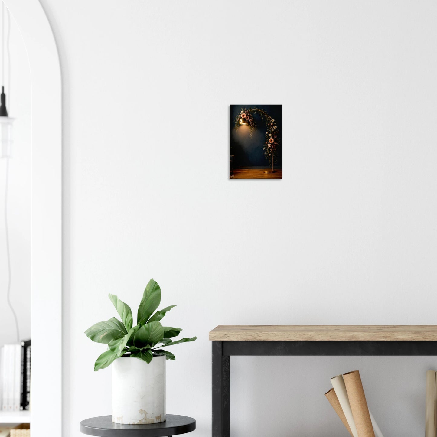 Colorful abstract painting on a white wall above a wooden console table with a plant.