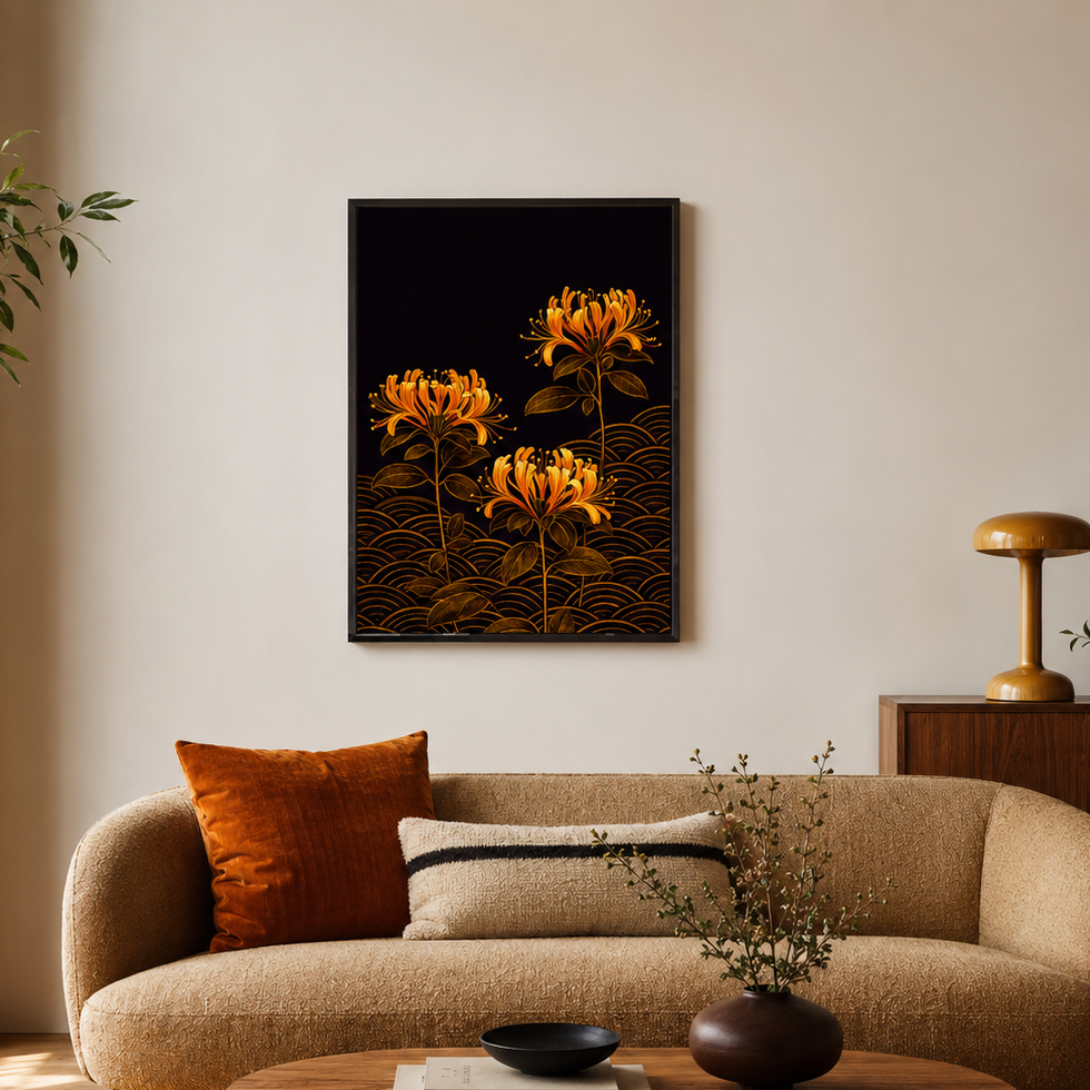 A framed wall art print featuring three glowing orange flowers on a black background, displayed above a beige sofa in a modern, sunlit living room.