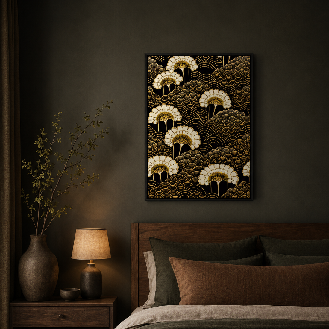 A framed wall art print featuring cream and gold ginkgo leaves over a dark wave pattern, displayed above a bed in a dark, moody bedroom.