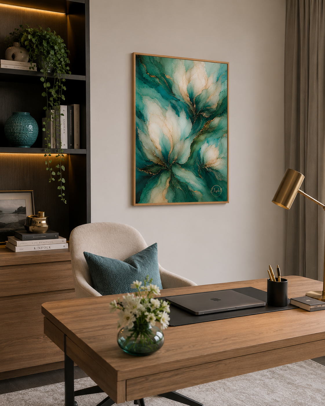 A framed abstract floral painting in teal, green, cream, and white hangs on a light beige wall above a wooden desk in a modern home office setting.