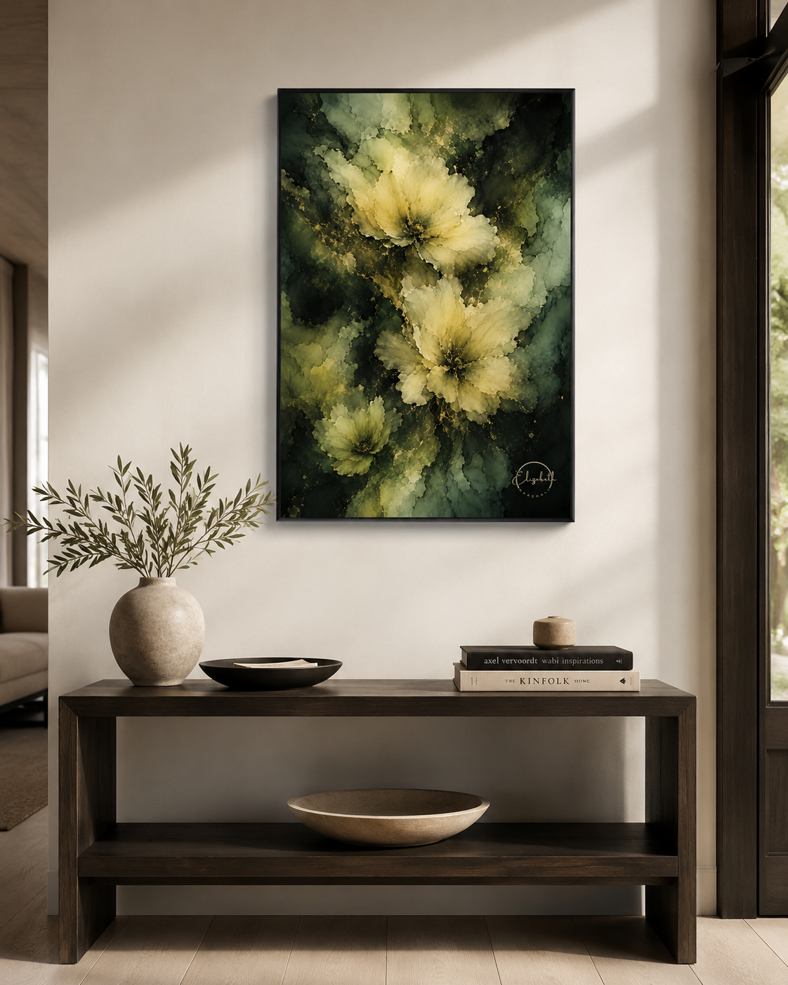 A framed vertical canvas print featuring abstract yellow flowers on a dark green and black textured background, displayed on a neutral wall above a dark wood console table with decorative items.