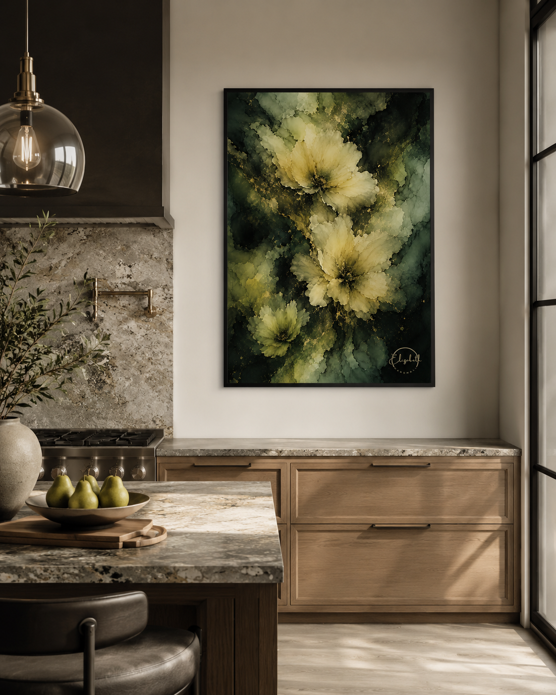 A vertical framed wall art print featuring an abstract floral design in olive green, dark green, and cream tones, displayed in a modern kitchen setting above wooden cabinets.