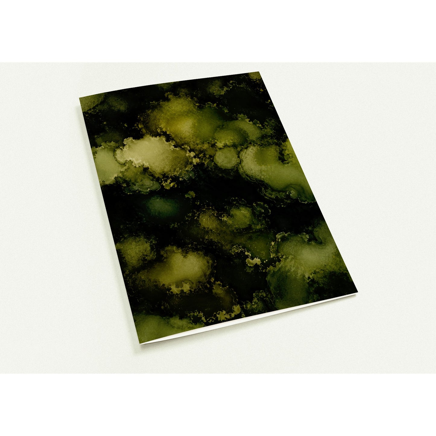 A note card print featuring an abstract fluid ink pattern in olive green, moss green, and black, shown at an angle on a light off-white background.