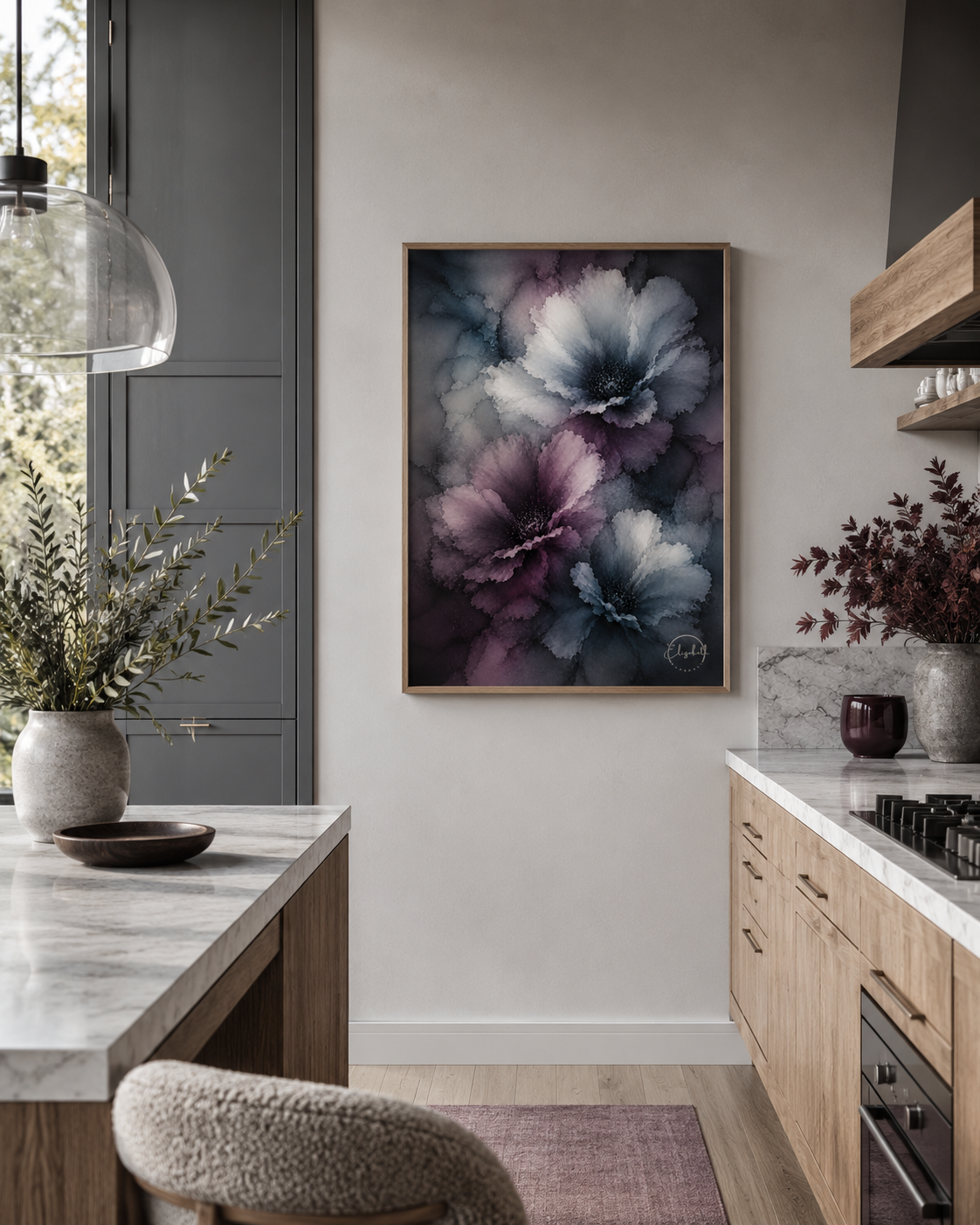 A framed wall art print featuring large abstract flowers in shades of purple, blue, and gray, displayed in a modern kitchen setting.