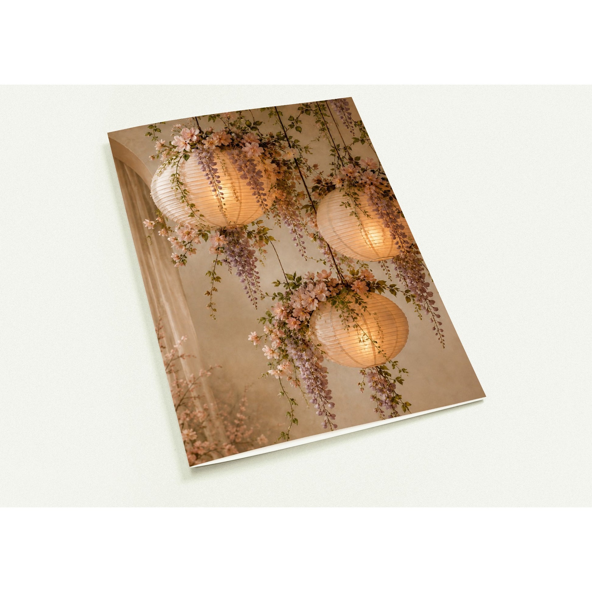 gift card with floral and paper lantern design on a white background