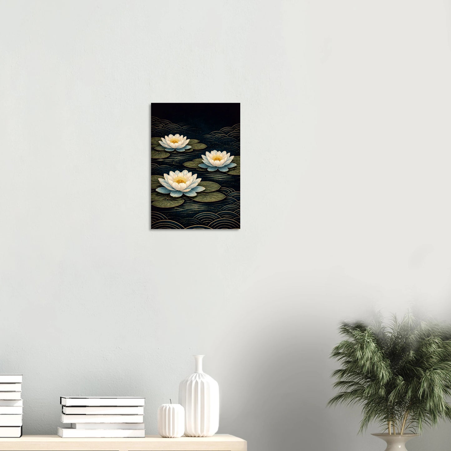 Waterlilies at Midnight floats three luminous blooms across a deep dark background, their ivory and blue-white petals opening wide around golden centres, resting on dark olive lily pads while gold seigaiha waves ripple silently beneath. 